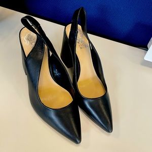 Black leather pumps
